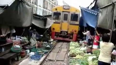 Train Passes Through Busy Farmers Market | Train Fanatics Videos