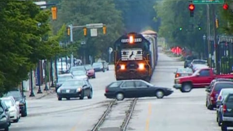 Locomotive Cruises Down Main Street Mid-Day! | Train Fanatics Videos