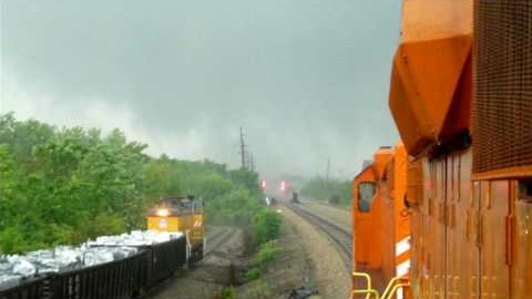 Fierce Tornado Hunts Down Train! | Train Fanatics Videos