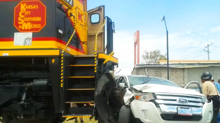 Train Wrecks Car As Driver Races Across Tracks! | Train Fanatics Videos