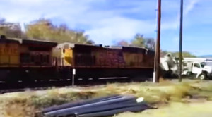 Man Videoing Train For Son Captures Crash