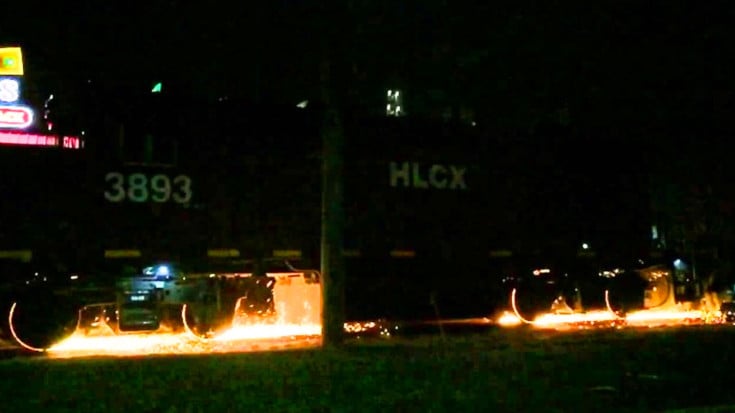 Image result for photo of rail grinders working at night with sparks flying