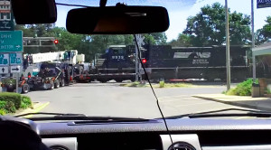 Freight Train Derails After Smashing Into Tractor Trailer!
