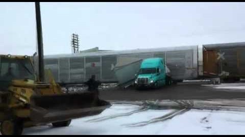 Semi Stuck On Track Is Sliced In Half By UP Freight! | Train Fanatics Videos