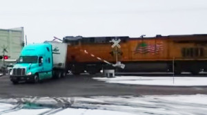 Semi Stuck On Track Is Sliced In Half By UP Freight!