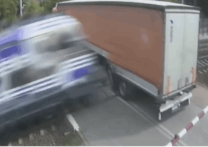 Passenger Train Blasts Truck At Grade Crossing